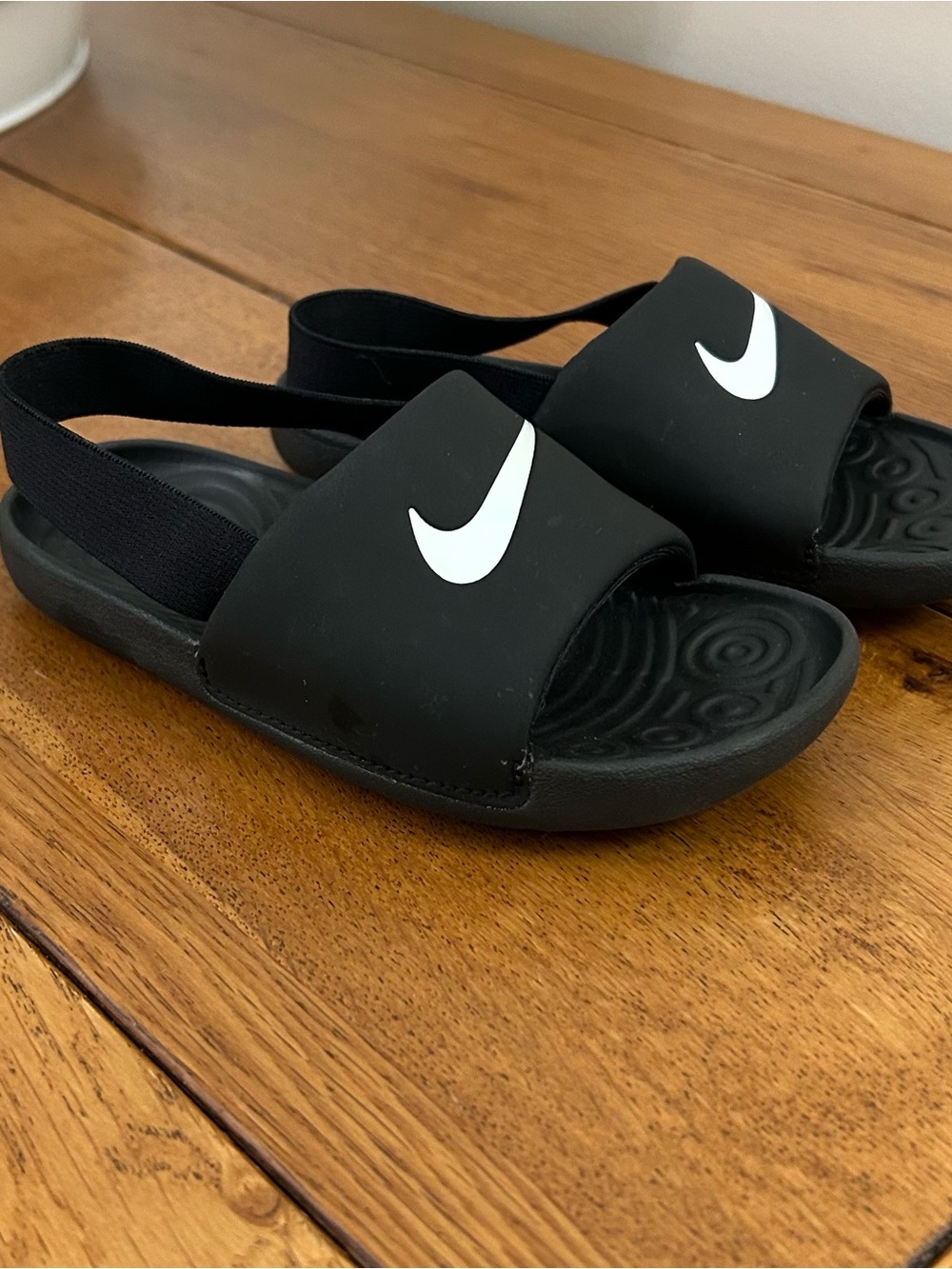 Nike Kids Black Slide Sandals with White Swoosh and Elastic Heel 10c